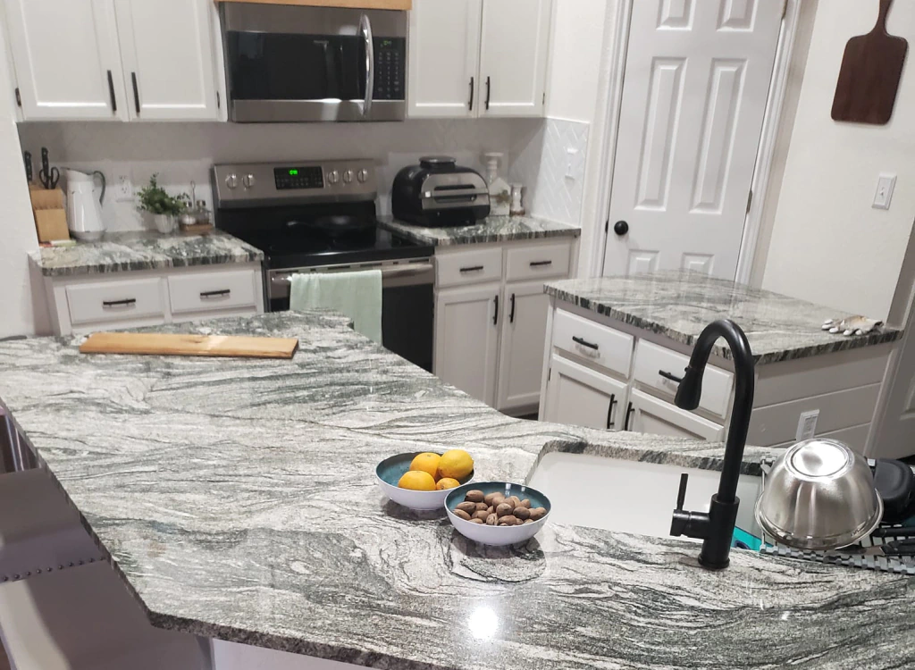countertop installed in a remodeled kitchen with cabinets